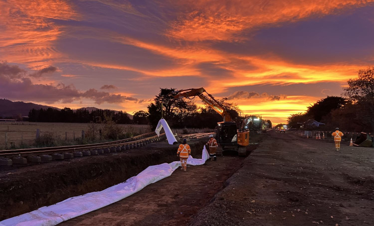 Purple-orange sunrise over Wairarapa rail work site